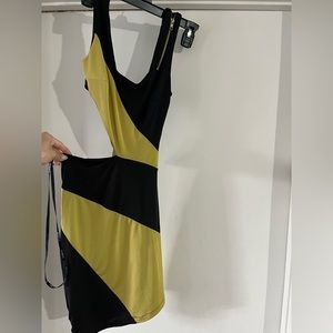 Two toned asymmetrical Bebe dress with tag.